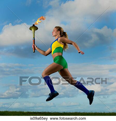 Brazilian runner carrying Olympic torch View Large Photo Image Stock Photo - Brazilian runner carrying Olympic torch. Fotosearch