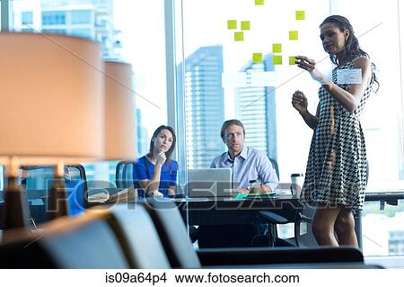Picture - Business people working in office. Fotosearch