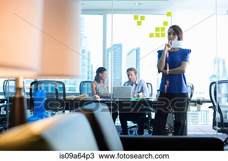 Business people working in office View Large Photo Image Stock Image - Business people working in office. Fotosearch
