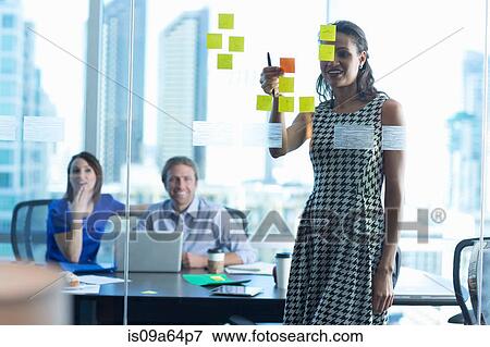 Business people working in office View Large Photo Image Stock Photo - Business people working in office. Fotosearch