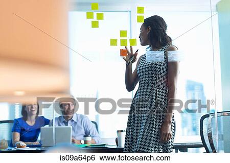 Business people working in office View Large Photo Image Stock Photograph - Business people working in office. Fotosearch