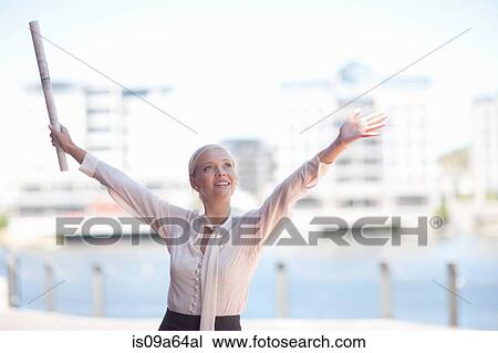 Businesswoman holding blueprints View Large Photo Image Stock Image - Businesswoman holding blueprints. Fotosearch