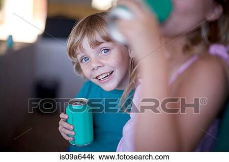 Children drinking soda in garage View Large Photo Image Stock Image - Children drinking soda in garage. Fotosearch