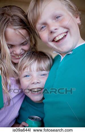 Children drinking soda in garage View Large Photo Image Stock Image - Children drinking soda in garage. Fotosearch