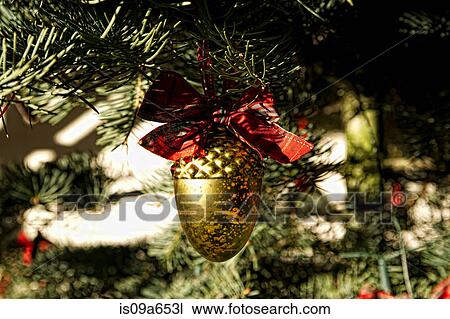 Stock Image - Christmas ornament on tree. Fotosearch
