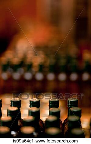 Close up of bottles in grocery View Large Photo Image Stock Image - Close up of bottles in grocery. Fotosearch