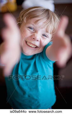 Picture - Close up of boy's smiling face. Fotosearch