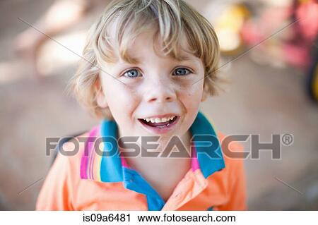 Close up of boy's smiling face View Large Photo Image Stock Image - Close up of boy's smiling face. Fotosearch