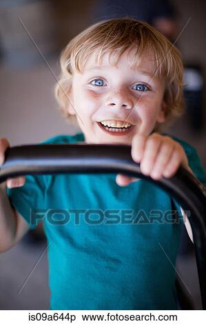 Close up of boy's smiling face View Large Photo Image Stock Photography - Close up of boy's smiling face. Fotosearch