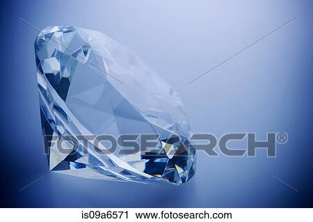 Stock Image - Close up of cut diamond. Fotosearch