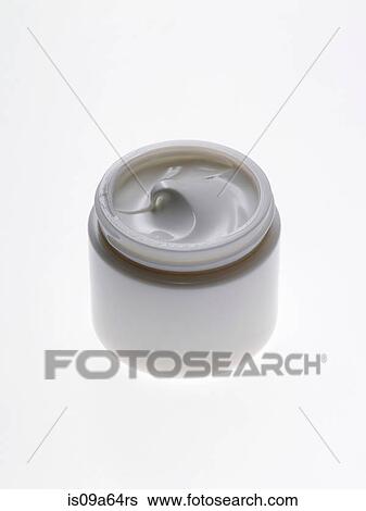 Stock Photograph - Close up of jar of lotion. Fotosearch