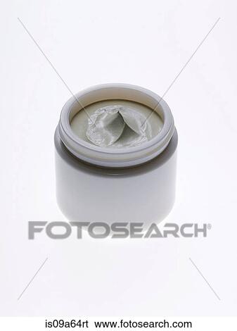 Stock Photograph - Close up of jar of lotion. Fotosearch