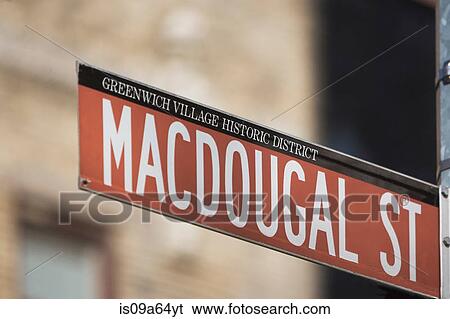 Stock Photograph - Close up of Macdougal St sign. Fotosearch