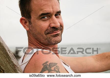 Picture - Close up of man's smiling face. Fotosearch