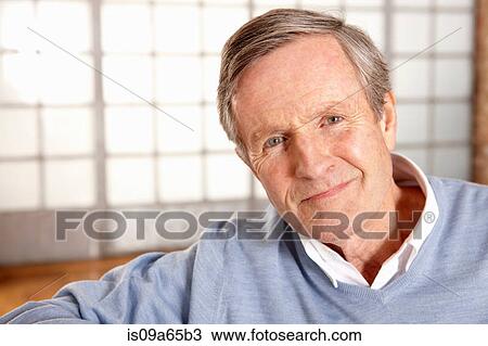 Stock Image - Close up of older man's smiling face. Fotosearch