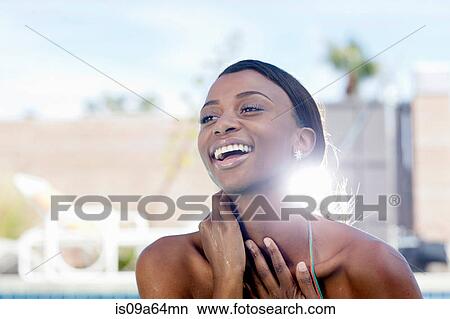 Close up of smiling woman's face View Large Photo Image Picture - Close up of smiling woman's face. Fotosearch