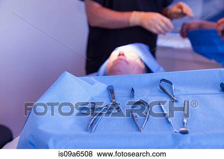 Stock Photo - Close up of tray of surgical tools. Fotosearch
