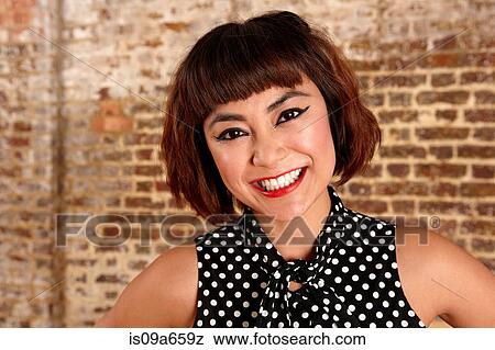 Stock Photo - Close up of woman's smiling face. Fotosearch