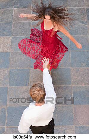 Couple dancing together outdoors View Large Photo Image Stock Image - Couple dancing together outdoors. Fotosearch