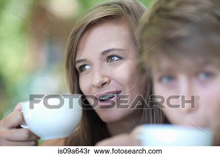 Couple having coffee together outdoors View Large Photo Image Stock Photography - Couple having coffee together outdoors. Fotosearch