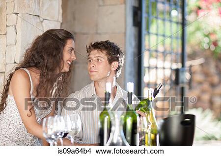 Couple tasting wine in doorway View Large Photo Image Picture - Couple tasting wine in doorway. Fotosearch