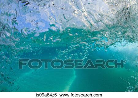 Crashing wave viewed underwater View Large Photo Image Stock Photograph - Crashing wave viewed underwater. Fotosearch
