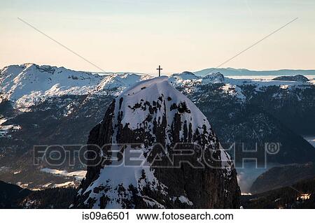 Cross on snowy mountaintop View Large Photo Image Stock Image - Cross on snowy mountaintop. Fotosearch