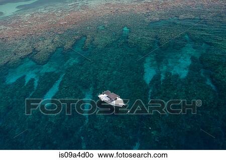 Dive boat above coral reef View Large Photo Image Picture - Dive boat above coral reef. Fotosearch