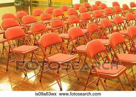 Empty chairs in auditorium View Large Photo Image Stock Photo - Empty chairs in auditorium. Fotosearch