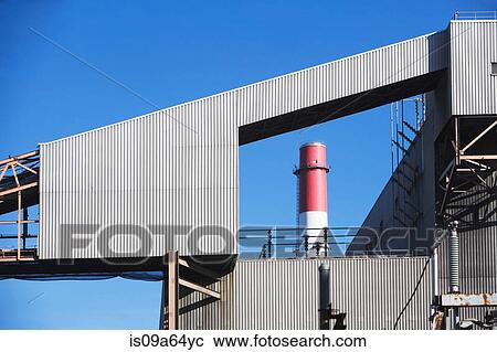 Factory infrastructure and smokestack View Large Photo Image Stock Image - Factory infrastructure and smokestack. Fotosearch