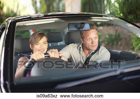 Father teaching teenage daughter driving View Large Photo Image Stock Photo - Father teaching teenage daughter driving. Fotosearch