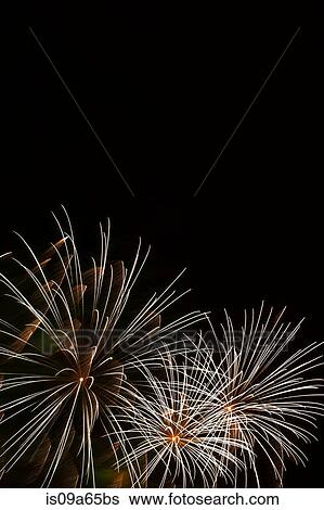 Fireworks exploding in sky View Large Photo Image Stock Photograph - Fireworks exploding in sky. Fotosearch