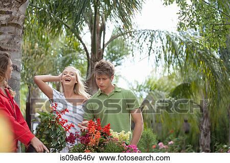 Friends walking together outdoors View Large Photo Image Stock Photo - Friends walking together outdoors. Fotosearch