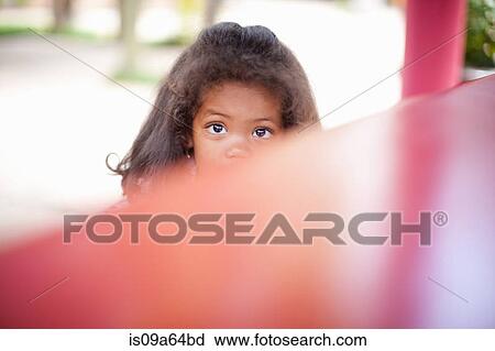 Girl peeking up from under table View Large Photo Image Stock Image - Girl peeking up from under table. Fotosearch