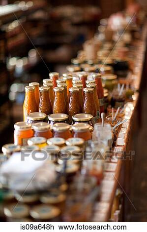 Jars of preserves and sauce in grocery View Large Photo Image Stock Image - Jars of preserves and sauce in grocery. Fotosearch