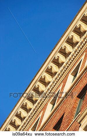 Stock Photograph - Low angle view of roof ledge. Fotosearch