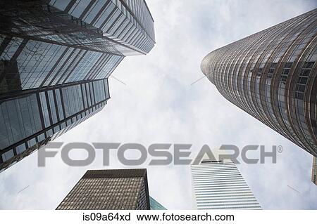 Stock Image - Low angle view of skyscrapers. Fotosearch