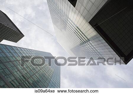 Stock Image - Low angle view of skyscrapers. Fotosearch
