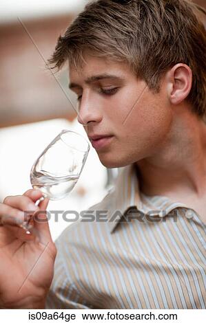 Man tasting wine in grocery View Large Photo Image Stock Image - Man tasting wine in grocery. Fotosearch