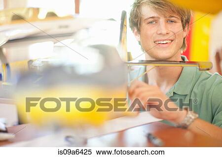 Man working on model airplane View Large Photo Image Stock Photography - Man working on model airplane. Fotosearch