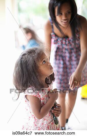 Mother and daughter walking outdoors View Large Photo Image Stock Photo - Mother and daughter walking outdoors. Fotosearch