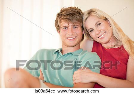 Mother and son relaxing together View Large Photo Image Stock Image - Mother and son relaxing together. Fotosearch
