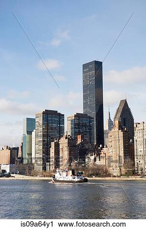 Stock Image - New York City skyline and water. Fotosearch