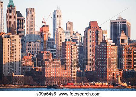 Stock Photograph - New York City skyline and water. Fotosearch