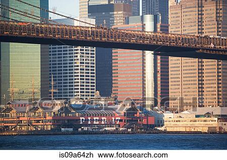 Stock Image - New York City skyscrapers and bridge. Fotosearch