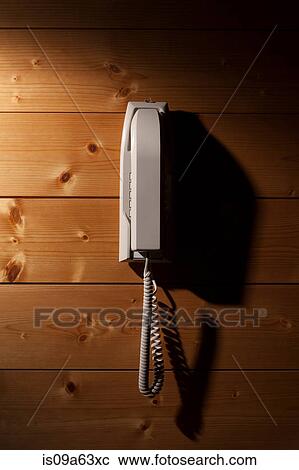 Phone mounted on wooden wall View Large Photo Image Stock Image - Phone mounted on wooden wall. Fotosearch