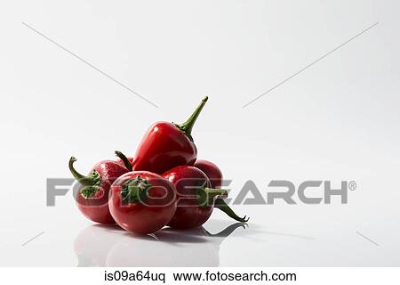 Stock Photography - Pile of small red peppers. Fotosearch