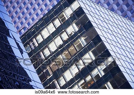 Stock Photograph - Reflective windows of urban skyscrapers. Fotosearch