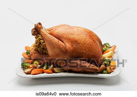 Roast stuffed chicken with vegetables View Large Photo Image Stock Image - Roast stuffed chicken with vegetables. Fotosearch