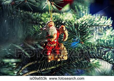 Santa Christmas ornament on tree View Large Photo Image Stock Image - Santa Christmas ornament on tree. Fotosearch